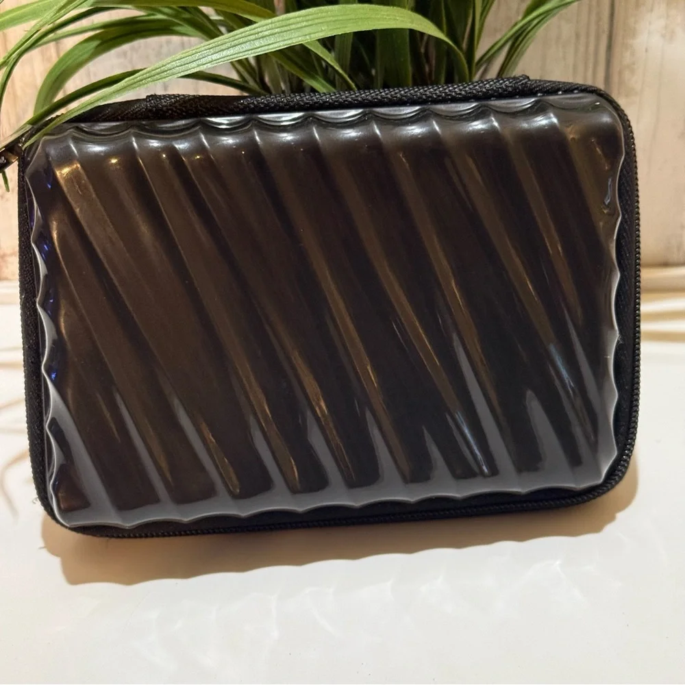 Tumi Glossy Black Travel Case Organizer